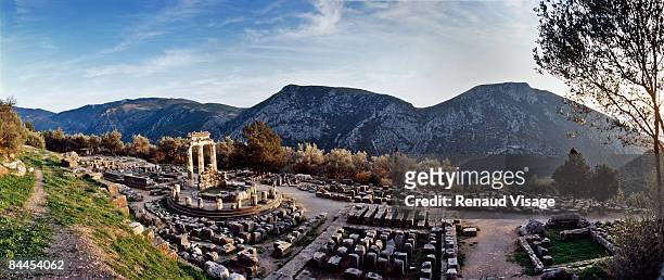 temple of athena in ancient delphi - delphi stock pictures, royalty-free photos & images