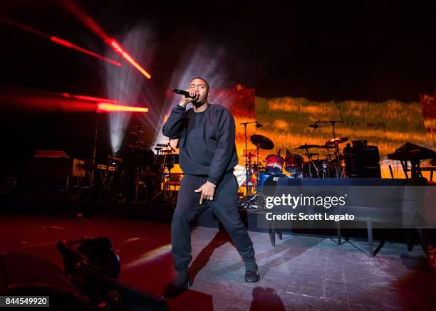 Rapper NAS performs in support of the PowerNomics Tour at Michigan Lottery Amphitheatre on September 8, 2017 in Sterling Heights, Michigan.