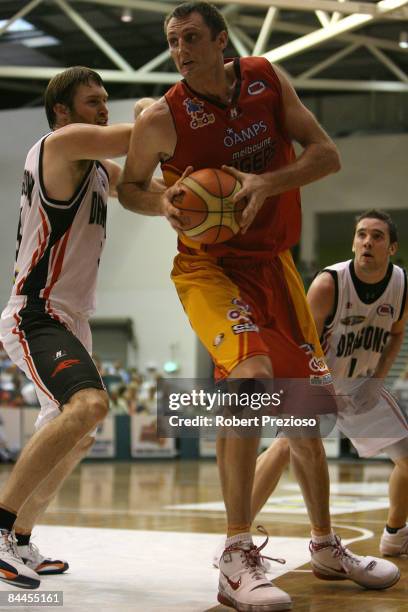 Chris Anstey of the Tigers rebounds during the round 20 NBL match between the Melbourne Tigers and the South Dragons held at the State Netball Hockey...