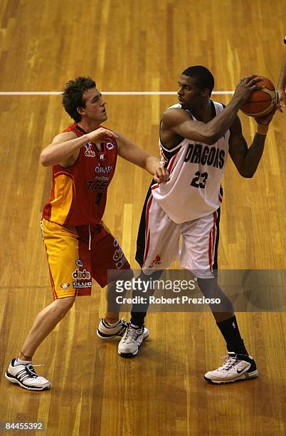 Donta Smith of the Dragons looks to pass the ball during the round 20 NBL match between the Melbourne Tigers and the South Dragons held at the State...