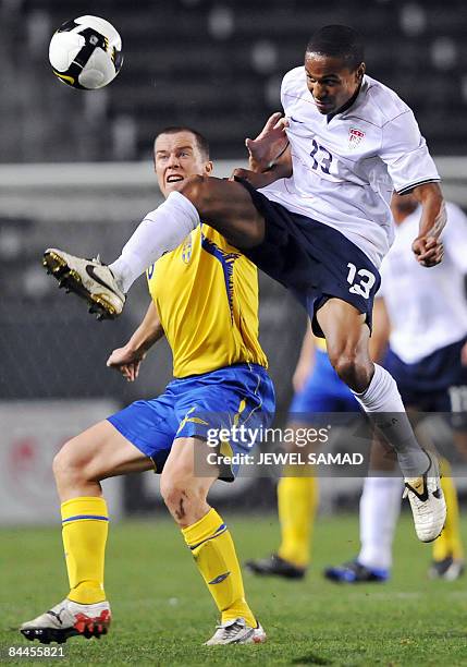 Ricardo Clark of USA vies for the ball with Daniel Andersson of Sweden during their international friendly match at the Home Depot Centre in Carson,...