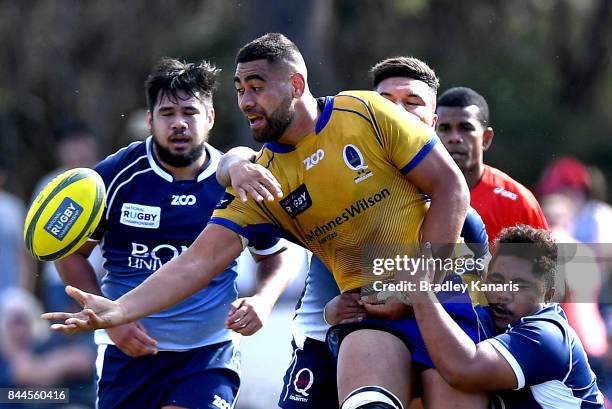 Lukhan Lealaiauloto-Tui of Brisbane City offloads during the round two NRC match between Queensland Country and Brisbane on September 9, 2017 in...