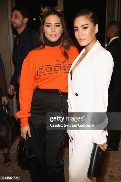 Lorenza Izzo and Janie Tienphosuwan attend Max Mara Celebrates Madison Avenue Boutique Reopening on September 8, 2017 in New York City.