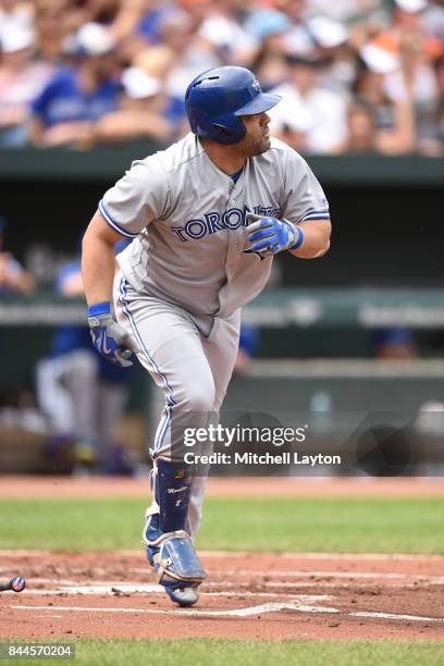 Miguel Montero of the Toronto Blue Jays runs to first base during a baseball game against the Baltimore Orioles at Oriole Park at Camden Yards on...