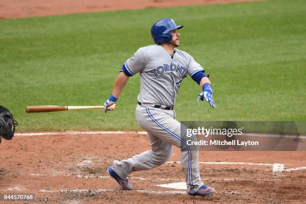 Miguel Montero of the Toronto Blue Jays takes a swing during a baseball game against the Baltimore Orioles at Oriole Park at Camden Yards on...