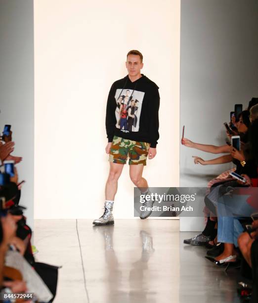 Designer Jeremy Scott appears on the runway during the Jeremy Scott fashion show during during New York Fashion Week at Spring Studios on September...