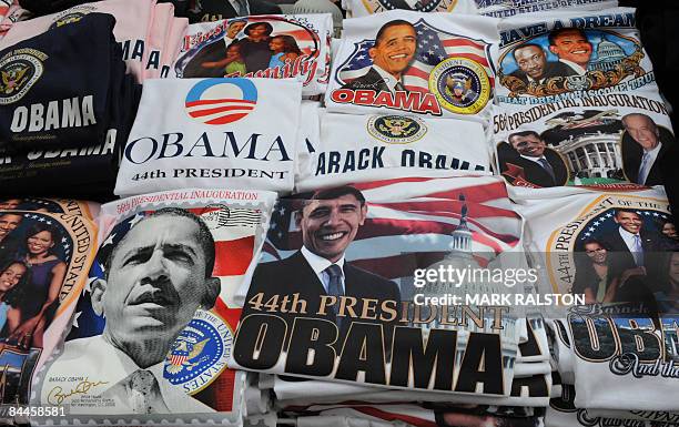 By Rob Lever Barack Obama merchandise is for sale at a stall outside the White House in Washington,DC on January 17, 2009. The US is awash in Obama...