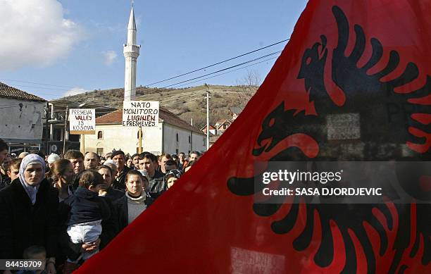 Friends and family of arrested ethnic Albanians wave an Albanian flag during a protest in Presevo, southern Serbia, on January 26, 2009. Some 3,000...