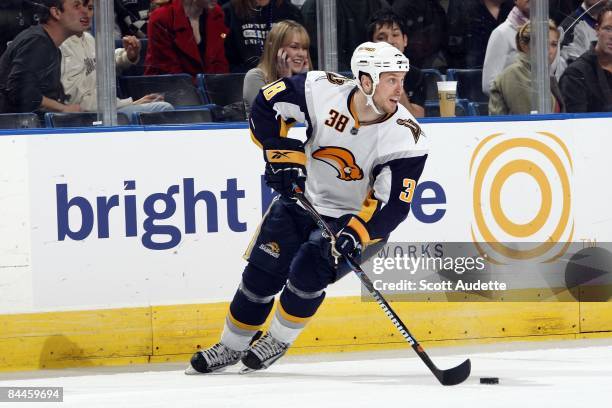 Nathan Paetsch of the Buffalo Sabres controls the puck against the Tampa Bay Lightning at the St. Pete Times Forum on January 21, 2009 in Tampa,...