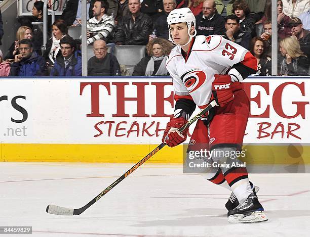 Anton Babchuk of the Carolina Hurricanes skates against the Toronto Maple Leafs on January 19, 2009 at the Air Canada Centre in Toronto, Ontario,...