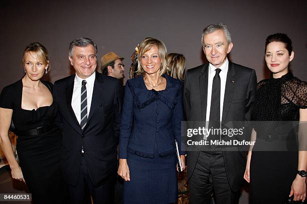 Estelle Lefebure, Sidney Toledano, Helene Arnault, Bernard Arnault and Marion Cotillard attends at the Christian Dior fashion show during Paris...