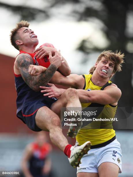 Benjamin Kennedy of the Casey Demons takes a mark during the VFL Semi Final match between Casey and Richmond at Fortburn Stadium on September 9, 2017...