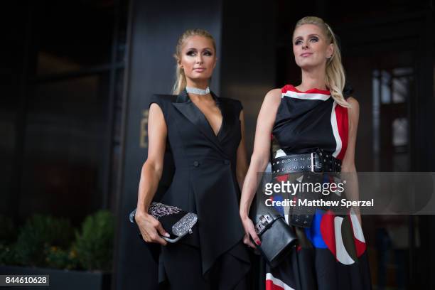 Paris Hilton & Nicky Rothschild-Hilton are seen attending Monse during New York Fashion Week wearing Edie Parker on September 8, 2017 in New York...