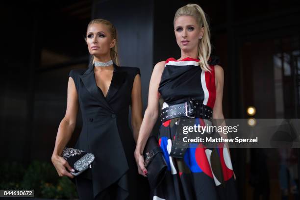 Paris Hilton & Nicky Rothschild-Hilton are seen attending Monse during New York Fashion Week wearing Edie Parker on September 8, 2017 in New York...