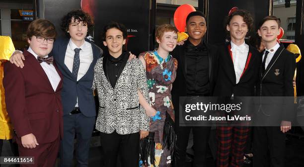 Actors Jeremy Ray Taylor, Finn Wolfhard, Jack Dylan Grazer, Sophia Lillis, Chosen Jacobs, Wyatt Oleff and Jaeden Lieberher attends the premiere of...