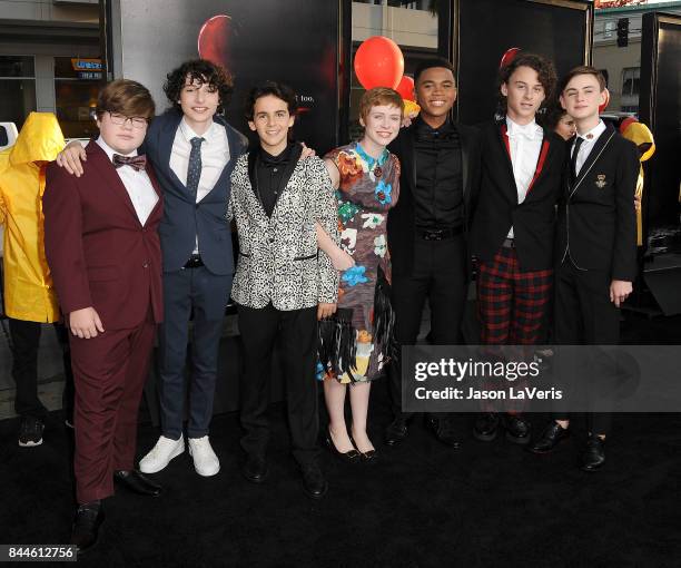 Actors Jeremy Ray Taylor, Finn Wolfhard, Jack Dylan Grazer, Sophia Lillis, Chosen Jacobs, Wyatt Oleff and Jaeden Lieberher attends the premiere of...