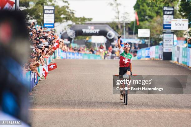 Nino Schurter of Switzerland celebrates winning the Elite Mens Cross Country race during the 2017 Mountain Bike World Championships on September 9,...