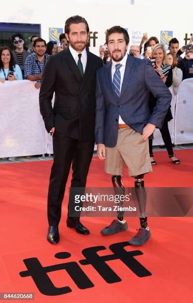 Jake Gyllenhaal and Jeff Bauman attend the 'Stronger' premiere during the 2017 Toronto International Film Festival at Roy Thomson Hall on September...