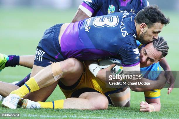Will Chambers of the Storm tackles Brad Takairangi of the Eels during the NRL Qualifying Final match between the Melbourne Storm and the Parramatta...