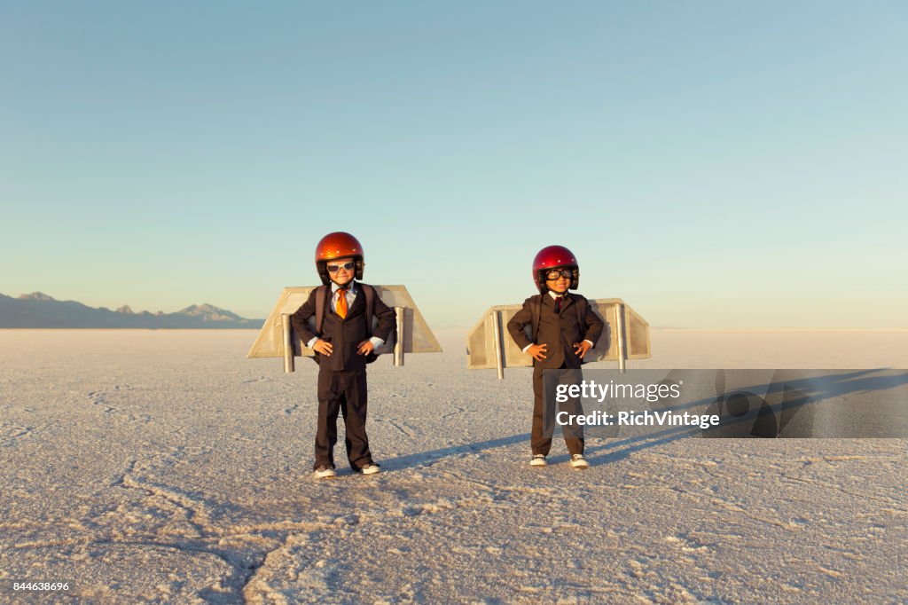 Two Young Businessman Wearing Jet Packs