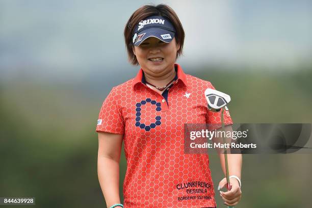 Hiroko Azuma of Japan reacts after her putt on the 3rd green during the third round of the 50th LPGA Championship Konica Minolta Cup 2017 at the Appi...