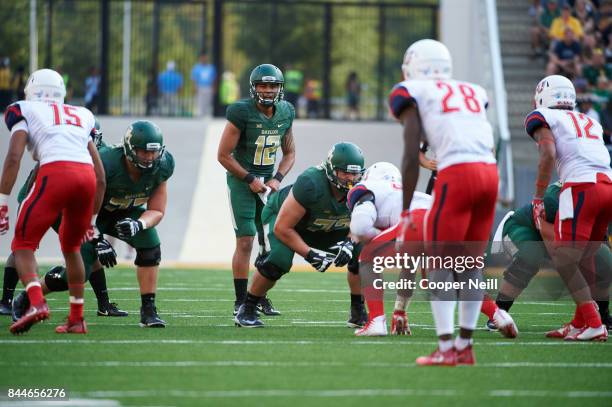 Anu Solomon of the Baylor Bears calls a play at the line of scrimmage against the Liberty Flames during a football game at McLane Stadium on...