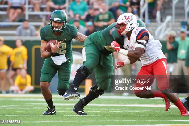 Anu Solomon of the Baylor Bears scrambles against the Liberty Flames during a football game at McLane Stadium on September 2, 2017 in Waco, Texas.