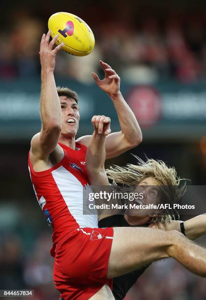 Dean Towers of the Swans marks the ball ahead of Dyson Heppell of the Bombers during the AFL Second Elimination Final match between the Sydney Swans...