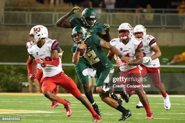 Anu Solomon of the Baylor Bears scrambles against the Liberty Flames during a football game at McLane Stadium on September 2, 2017 in Waco, Texas.