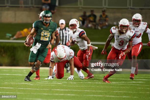 Anu Solomon of the Baylor Bears scrambles against the Liberty Flames during a football game at McLane Stadium on September 2, 2017 in Waco, Texas.