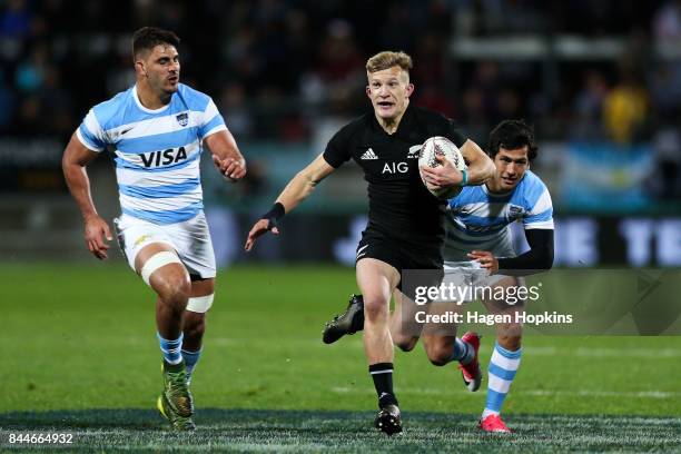 Damian McKenzie of New Zealand makes a break during The Rugby Championship match between the New Zealand All Blacks and Argentina at Yarrow Stadium...