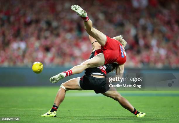 Mark Baguley of the Bombers competes for the ball against Isaac Heeney of the Swans during the AFL Second Elimination Final match between the Sydney...