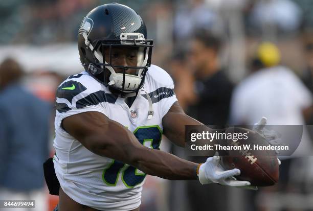 Kasen Williams of the Seattle Seahawks warms up during pregame warm ups prior to the start of his game against the Oakland Raiders at the...