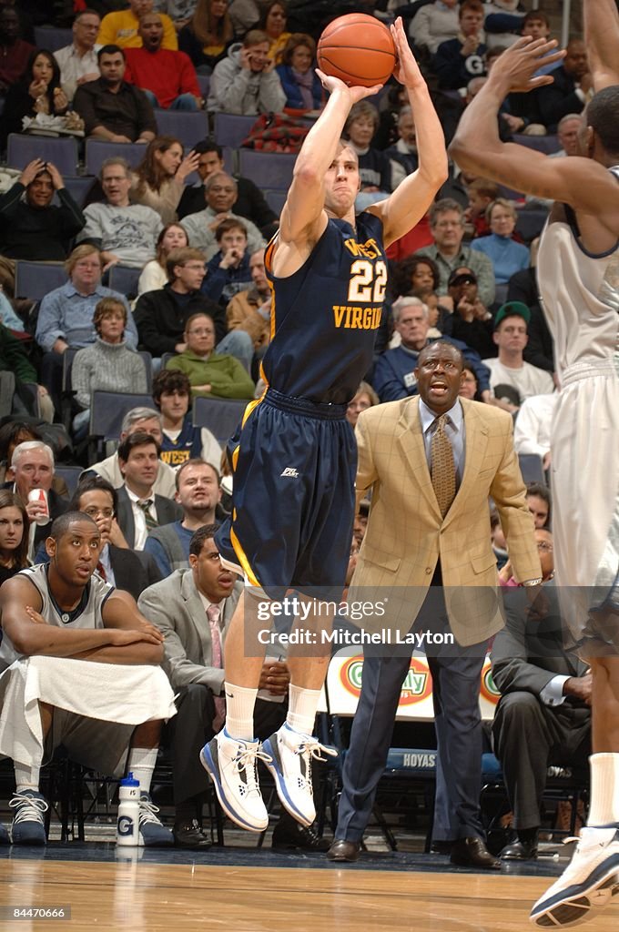 Alex Ruffa Alex Ruoff of the West Virginia Mountaineers makes a jump shot during ...