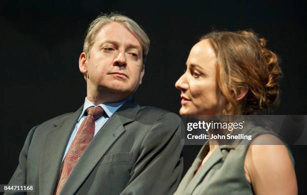 Lydia Leonard as Mona Juul and Thomas Arnold perform on stage during a performance of 'Oslo' by J.T.Rogers at The National Theatre on September 8,...