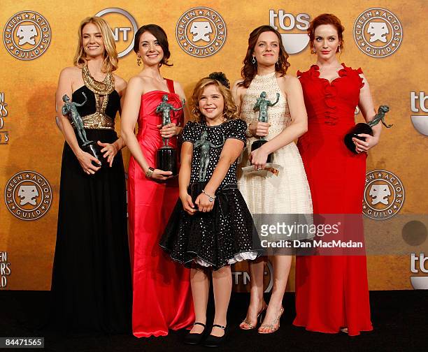 The cast of "Mad Men" pose with their award for Outstanding Perforrmance by an Ensemble in a Drama Series in the press room of the 15th Annual Screen...