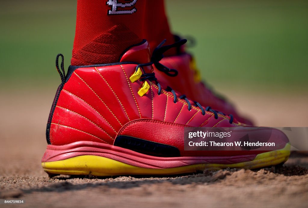 A detailed view of the red Nike Air Jordans XII baseball cleats worn  News Photo - Getty Images