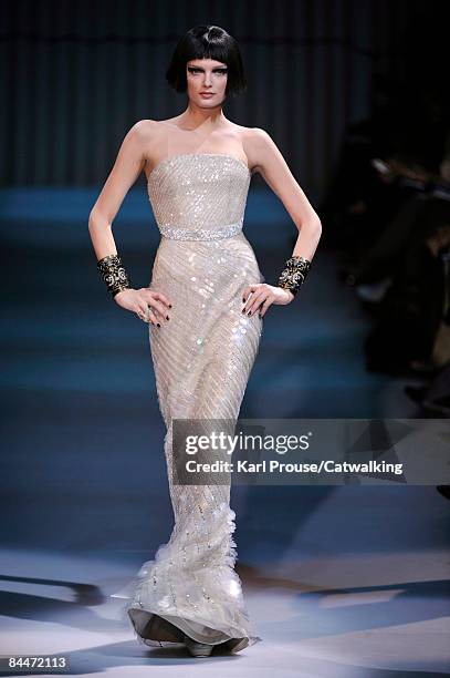 Model walks the runway at the Giorgio Armani Prive fashion show during Paris Fashion Week Haute Couture Spring/Summer 2009 on January 26, 2009 in...
