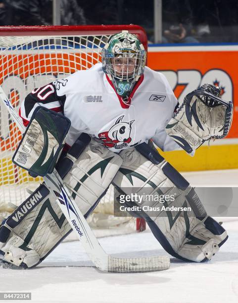 Jeremy Smith of the Niagara Ice Dogs keeps his eye on the play in a game against the London Knights on January 23, 2009 at the John Labatt Centre in...