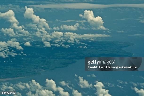 clouds on tokunoshima island in okinawa prefecture daytime aerial view from airplane - satsunan islands fotografías e imágenes de stock