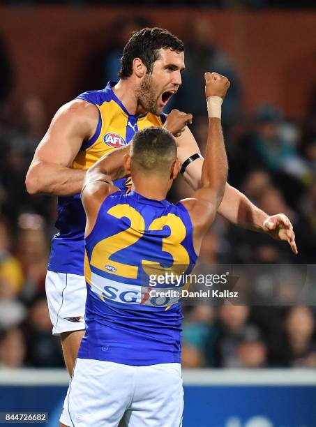 Jack Darling of the Eagles celebrates with Lewis Jetta of the Eagles after kicking a goal during the AFL First Elimination Final match between Port...