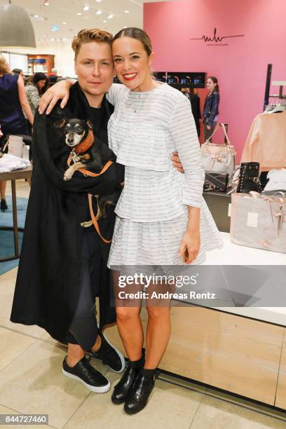 Designer Dawid Tomaszewski and Marina Hoermanseder attend the VOGUE Fashion's Night Out Duesseldorf on September 8, 2017 in Duesseldorf, Germany.