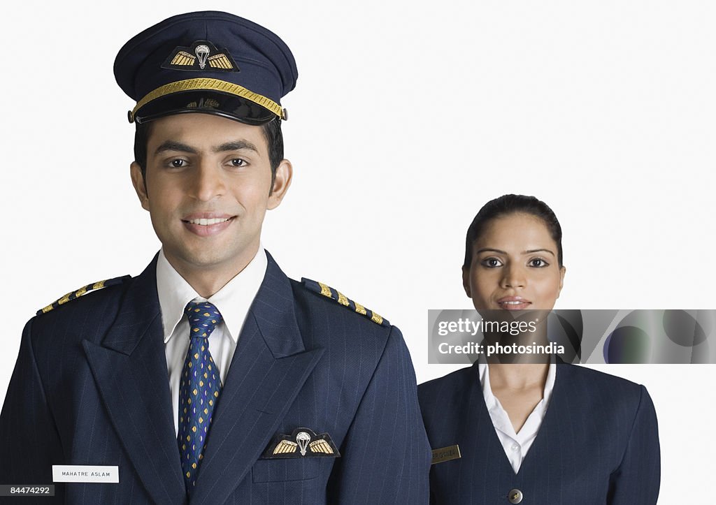 Portrait of a pilot with an air hostess