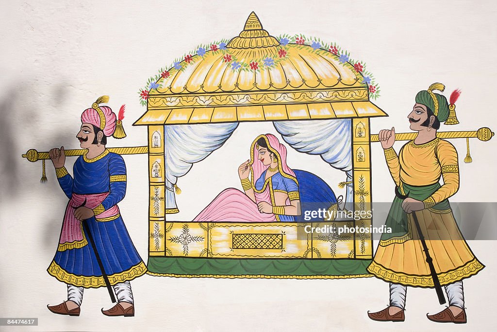 Two men carrying the palanquin of a bride