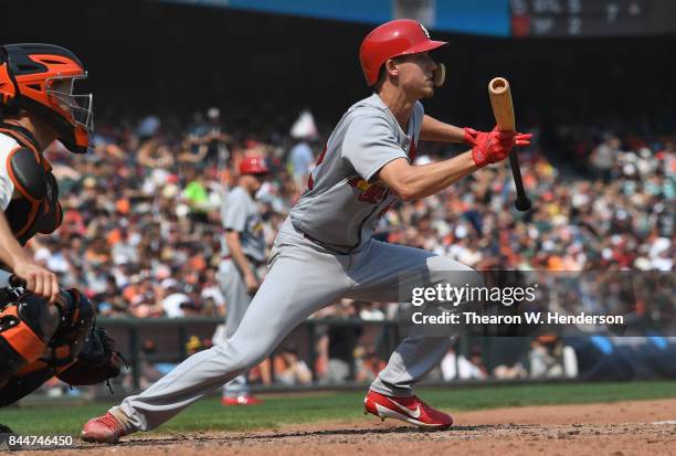 Luke Weaver of the St. Louis Cardinals attempts to bunt against the San Francisco Giants in the top of the six inning at AT&T Park on September 3,...