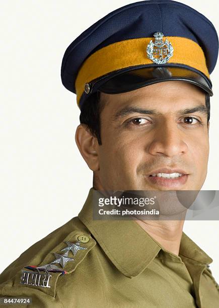 portrait of a policeman - indian police officer image with uniform stock-fotos und bilder