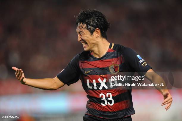 Celebrates scoring his side's first goal during during the J.League J1 match between Kashima Antlers and Omiya Ardija at Kashima Soccer Stadium on...