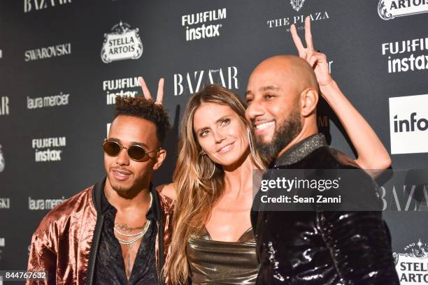 Lewis Hamilton, Heidi Klum and Swizz Beatz attend 2017 Harper's Bazaar Icons at The Plaza Hotel on September 8, 2017 in New York City.