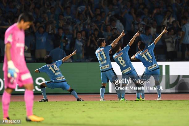 Akihiro Ienaga of Kawasaki Frontale celebrates scoring his side's third goal with his team mate during the J.League J1 match between Kawasaki...