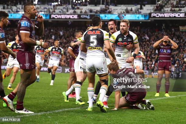 Bryce Cartwright of the Panthers celebrates with his team mates after scoring a try during the NRL Elimination Final match between the Manly Sea...